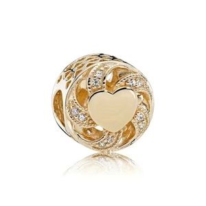 Gold heart charm
